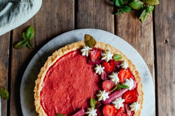 A beautifully decorated rhubarb and strawberry tart. 