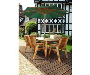A handcrafted outdoor dining table & chairs set from the artisans at Charles Taylor Trading LTD.